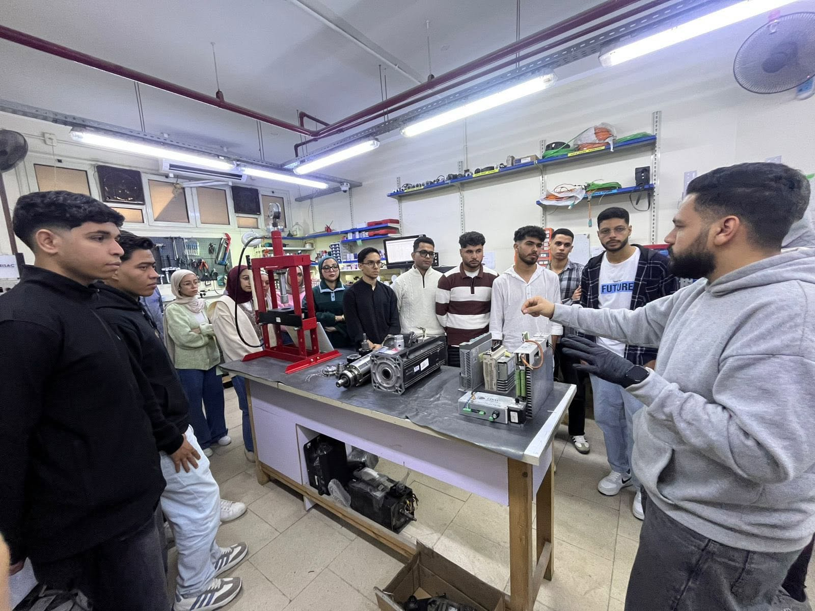EISAC engineers and trainees in the industrial workshop